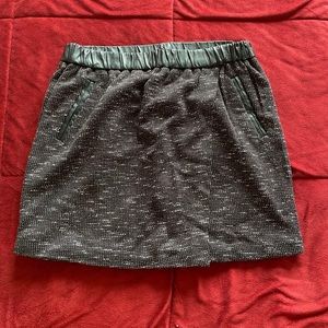 Skirt with faux leather detail